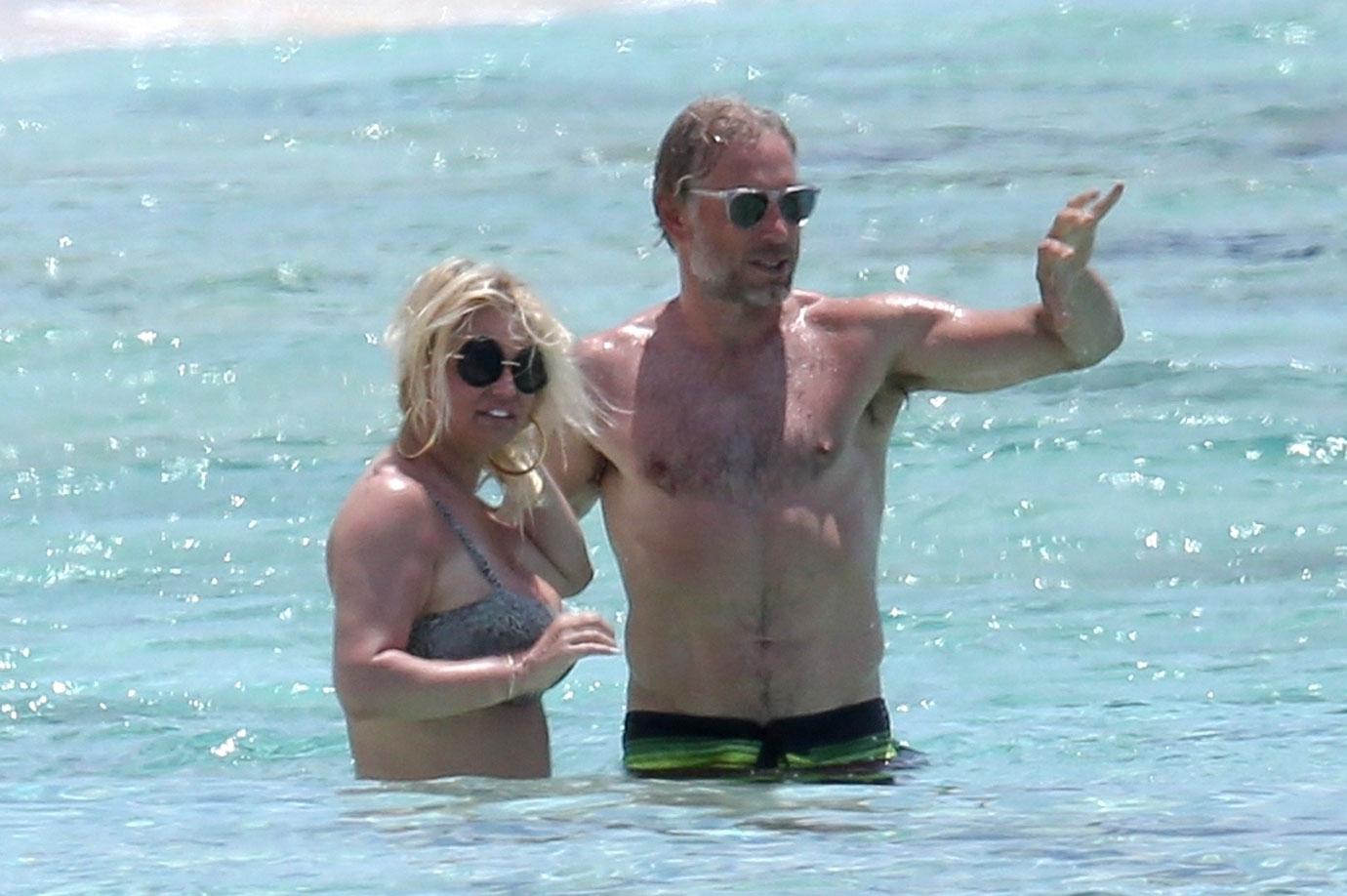 Pregnant Belly? Jessica Simpson Shows Off Bikini Body With Husband