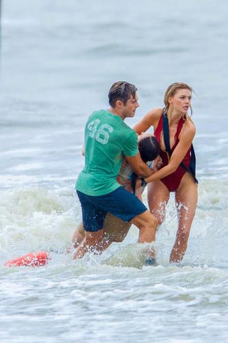 Bikini Clad Kelly Rohrbach Bares Curves Alongside Ripped Zac Efron Dwayne Johnson