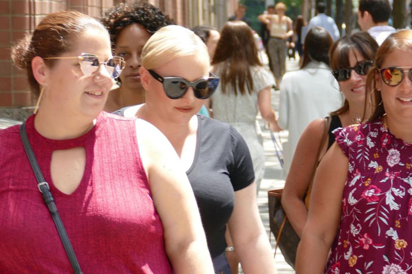 Meghan McCain Leaving the View Wearing A Black Top And Flowered Pants Walking With Friends