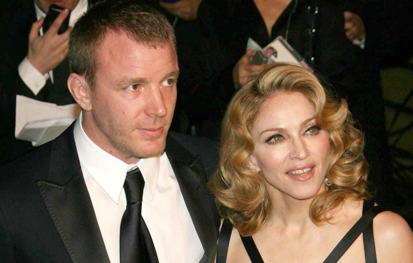 Madonna dazzled in a black dress alongside her ex-husband, Guy Ritchie (who wore a black suit and tie), at the annual Vanity Fair Post Oscar party in Beverly Hills.