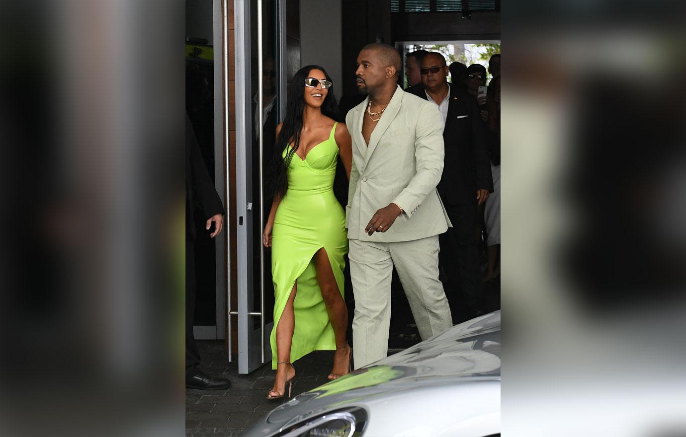 Kanye West Grabs Wife Kim Kardashian's Butt As She Rocks Curve-Hugging  Latex Dress