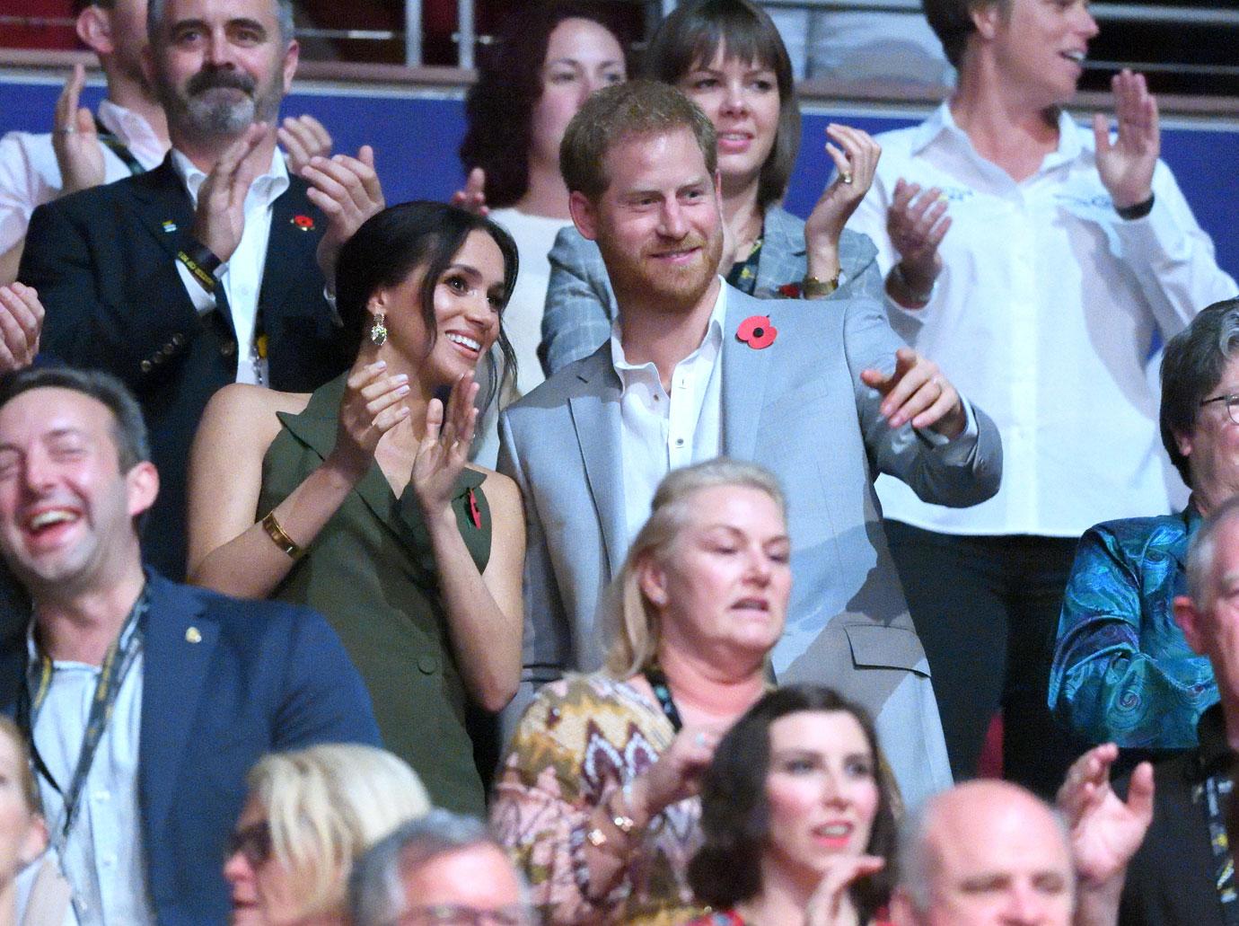 //prince harry and pregnant meghan markle attend invictus games closing