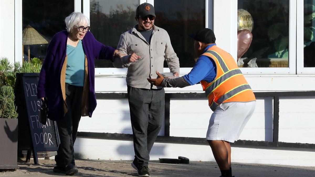 image of The 92-year-old actress was seen smiling as she chatted with her companion during the outing.