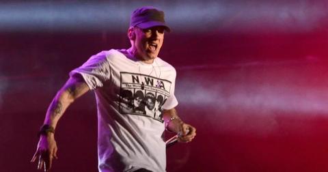eminem in white shirt performing