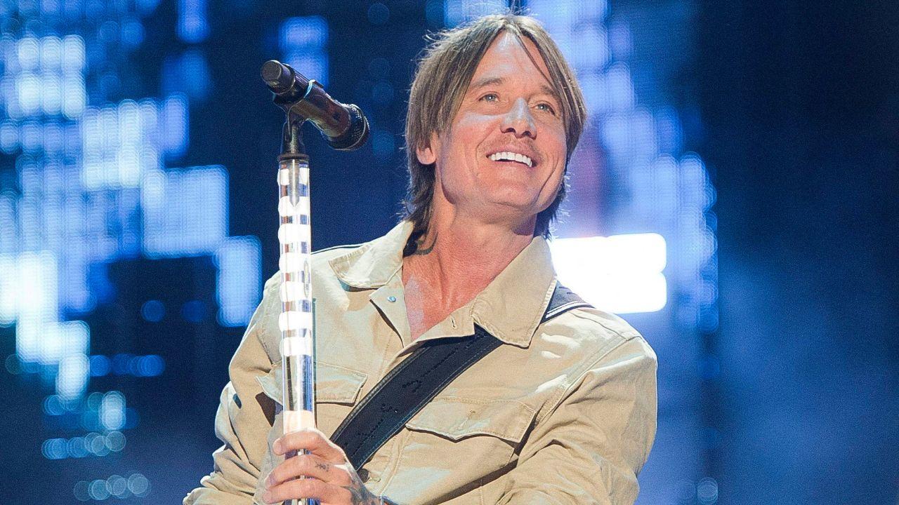 image of Keith Urban has also faced romance rumors involving fellow country singer Karley Scott Collins.