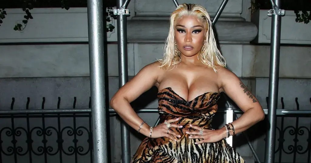 nicki minaj sues blogger over cocaine claims comments son