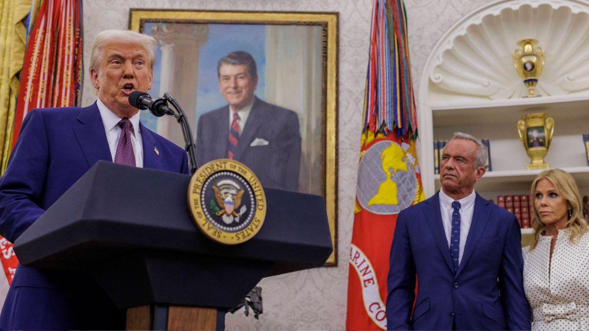 Photo of Donald Trump, Robert F. Kennedy Jr., Cheryl Hines