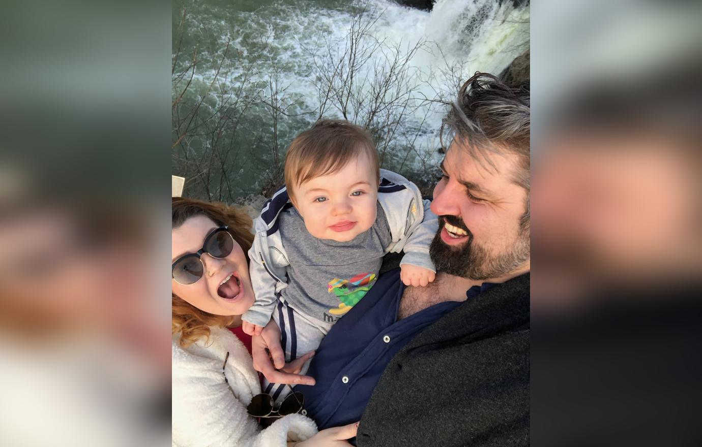 Amber Portwood and Boyfriend Andrew Glennon Pose Near a Waterfall Smiling Holding Their Son