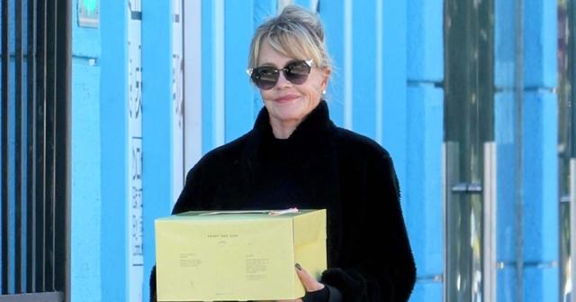 melanie griffith steps out bruises face hand skin cancer pp