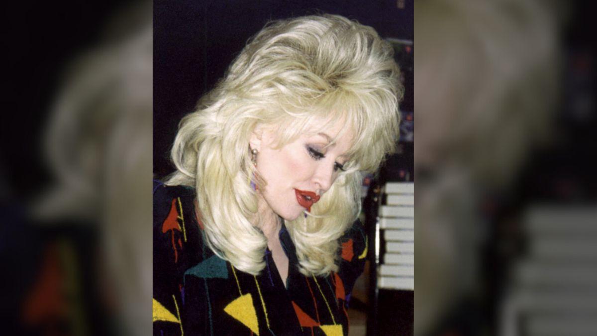 image of Dolly Parton looked nearly unrecognizable in early throwback photos showing her naturally shaped lips before her signature pout.