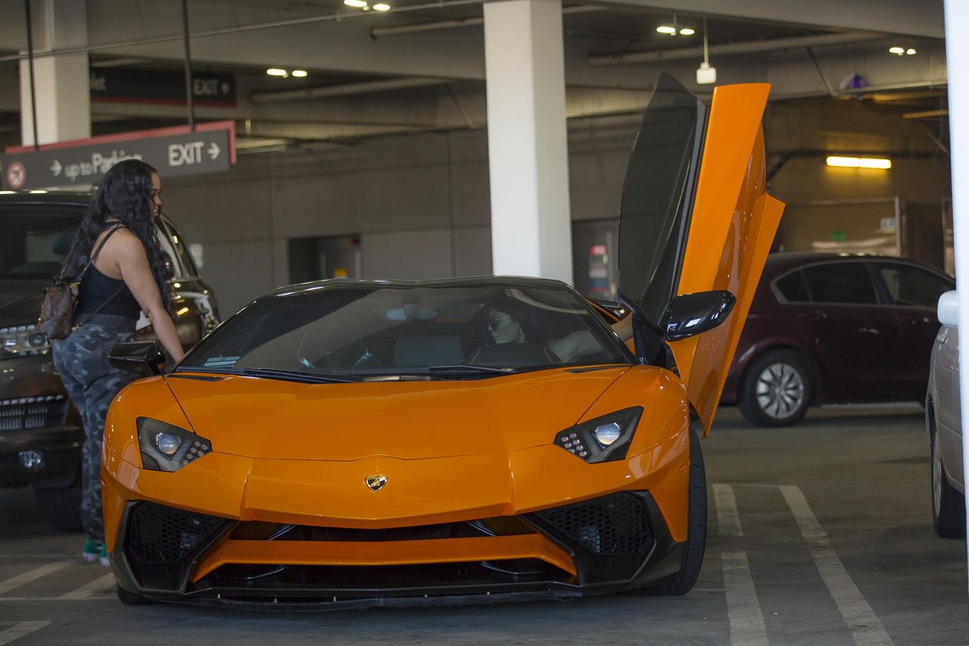 Kylie Jenner Getting Out of a Lamborghini Aventador Roadster March