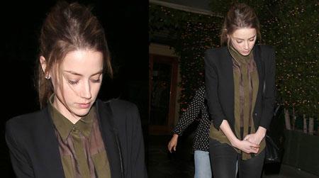 //amber heard hides ring pp