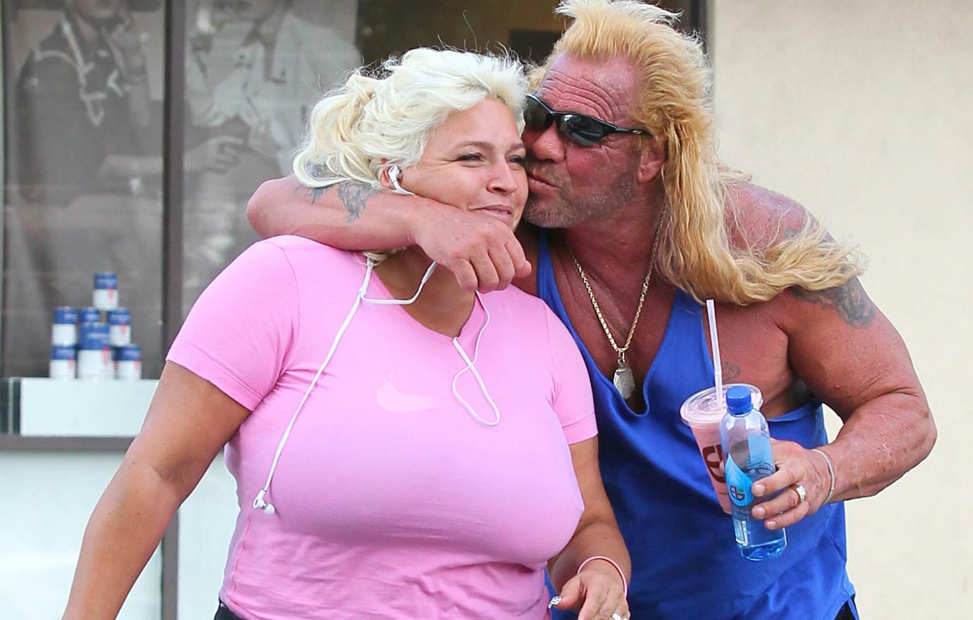 Duane Chapman and Beth Chapman shared their adoration for each other as she wore a pink short-sleeved shirt and Dog sported black sweatpants and a blue muscle shirt.