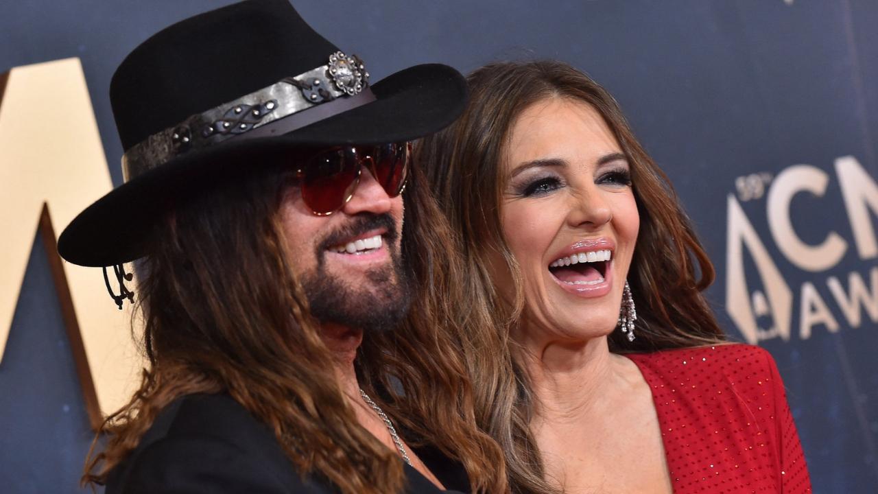 Photo of Billy Ray Cyrus, Elizabeth Hurley