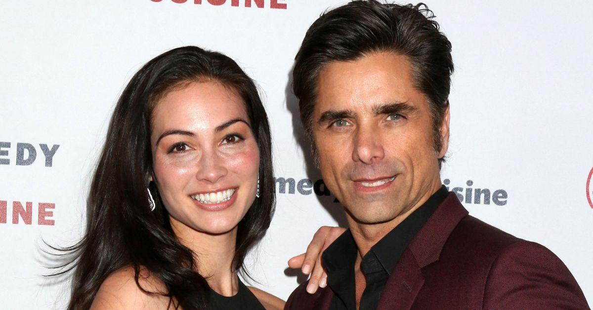 Photo of John Stamos and Caitlin McHugh. 