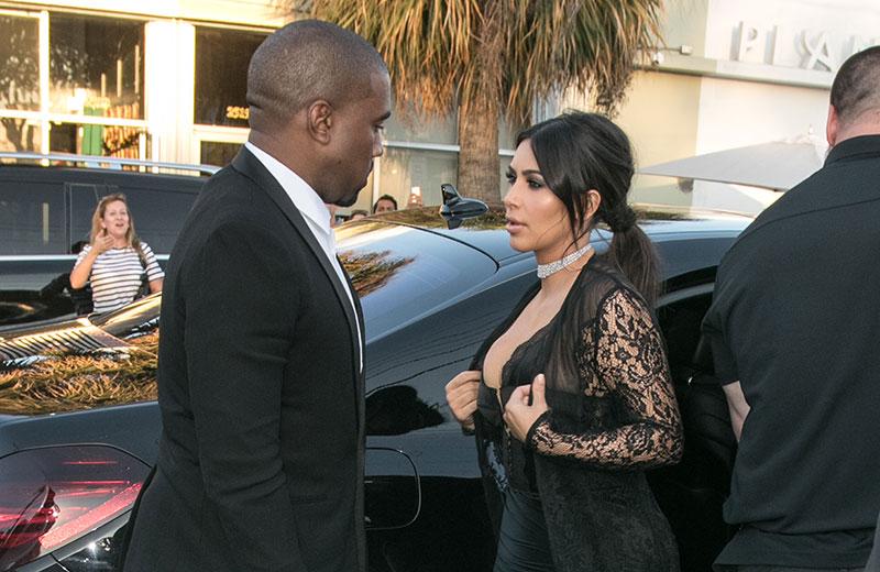 Kim's Crazy Cleavage! She Wears Black Lace Lingerie To A Wedding