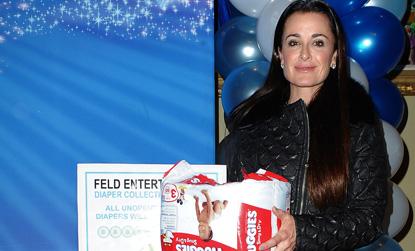 //kyle_richards_donates_diapers_to_baby_buggy_at_a_premiere_of_disney_on_ice_