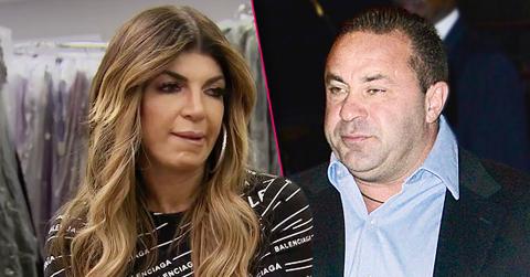 Guilty Looking Teresa Giudice Wearin Balenciaga Top; Joe Giudice Wearing Dark Suit and Light Blue Shirt Looking Left