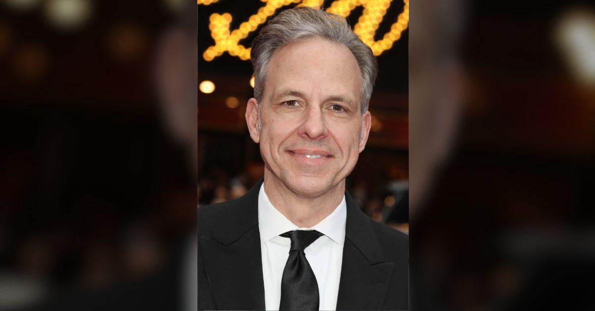 According to a network insider, Jake Tapper's hot mic remark came after losing his CNN prime time slot in 2022.