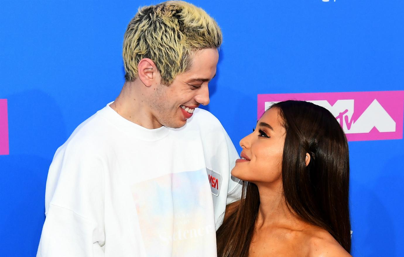 Pete Davidson was all smiles, sporting a white long sleeved T-shirt while his girlfriend at the time Ariana Grande dazzled in a floral print strapless dress.