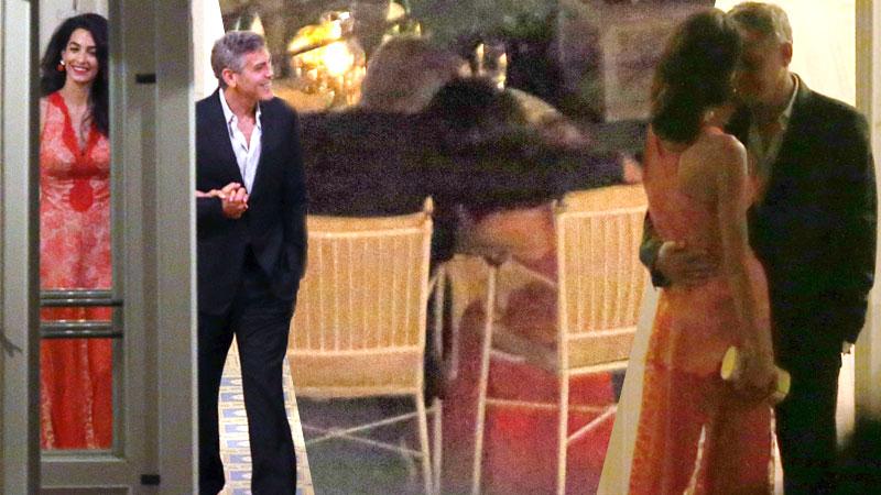 //george clooney amal clooney dinner italy kiss hold hands pp