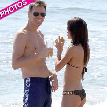 Jim Carrey Flaunts His Abs And New Much Younger Girlfriend On Beach Date