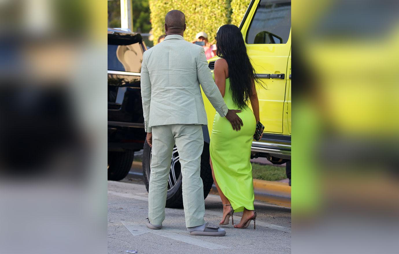 Kanye West Grabs Wife Kim Kardashian's Butt As She Rocks Curve-Hugging  Latex Dress