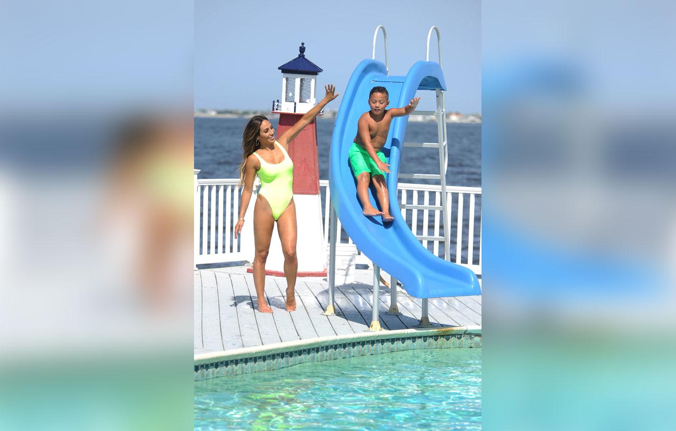 Melissa Gorga Enjoys Pool Day With Son In Neon Swimsuit