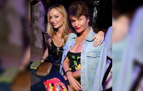 l r georgina chapman and helena christensen attend atlantis paradise island bahamas th anniversary bal de royale at atlantis paradise island on november in nassau bahamas