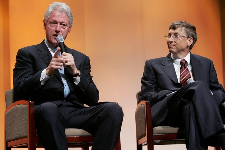 8 Ridiculous Pictures Of Bill Clinton Manspreading