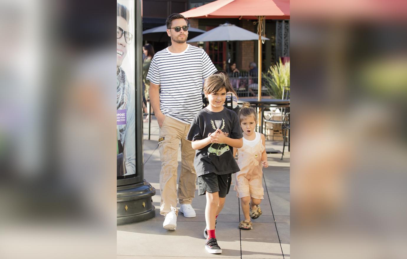 Scott Disick Watches Kids While Kourtney Kardashian Is In Paris