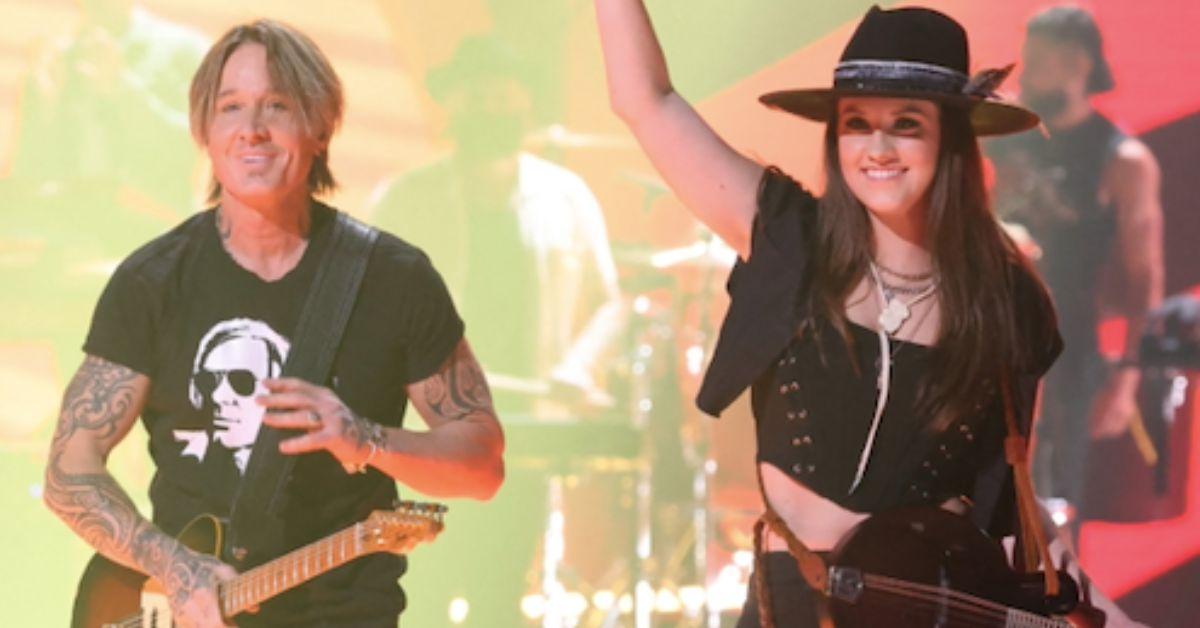 The country singer's onstage flirtations with 25-year-old guitarist Maggie Baugh, sparked romance rumors.