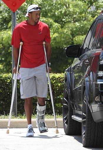 Tiger Woods: On Crutches & Wearing Medical Walking Boot