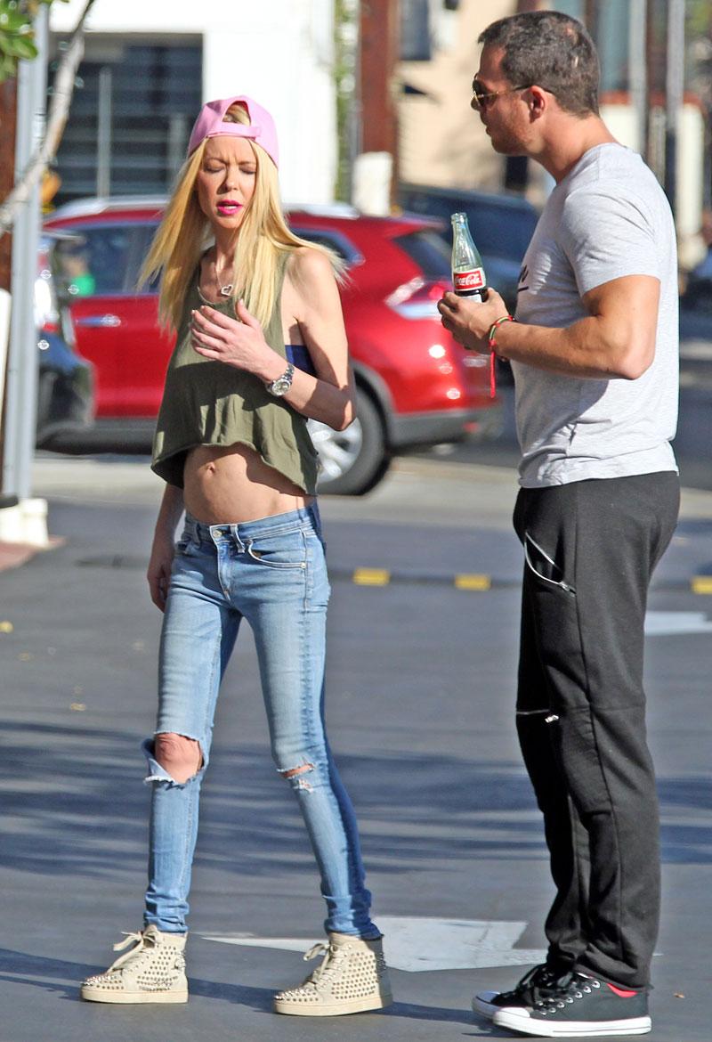 Toothpick Tara Reid Shows Off Bloated Belly For New Mystery Man