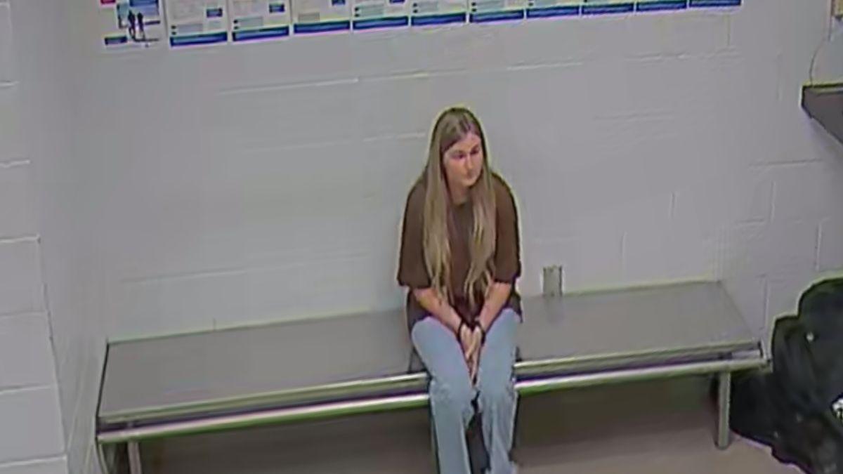 image of The 27-year-old was directed to a wall and searched by an officer as part of standard booking procedures.