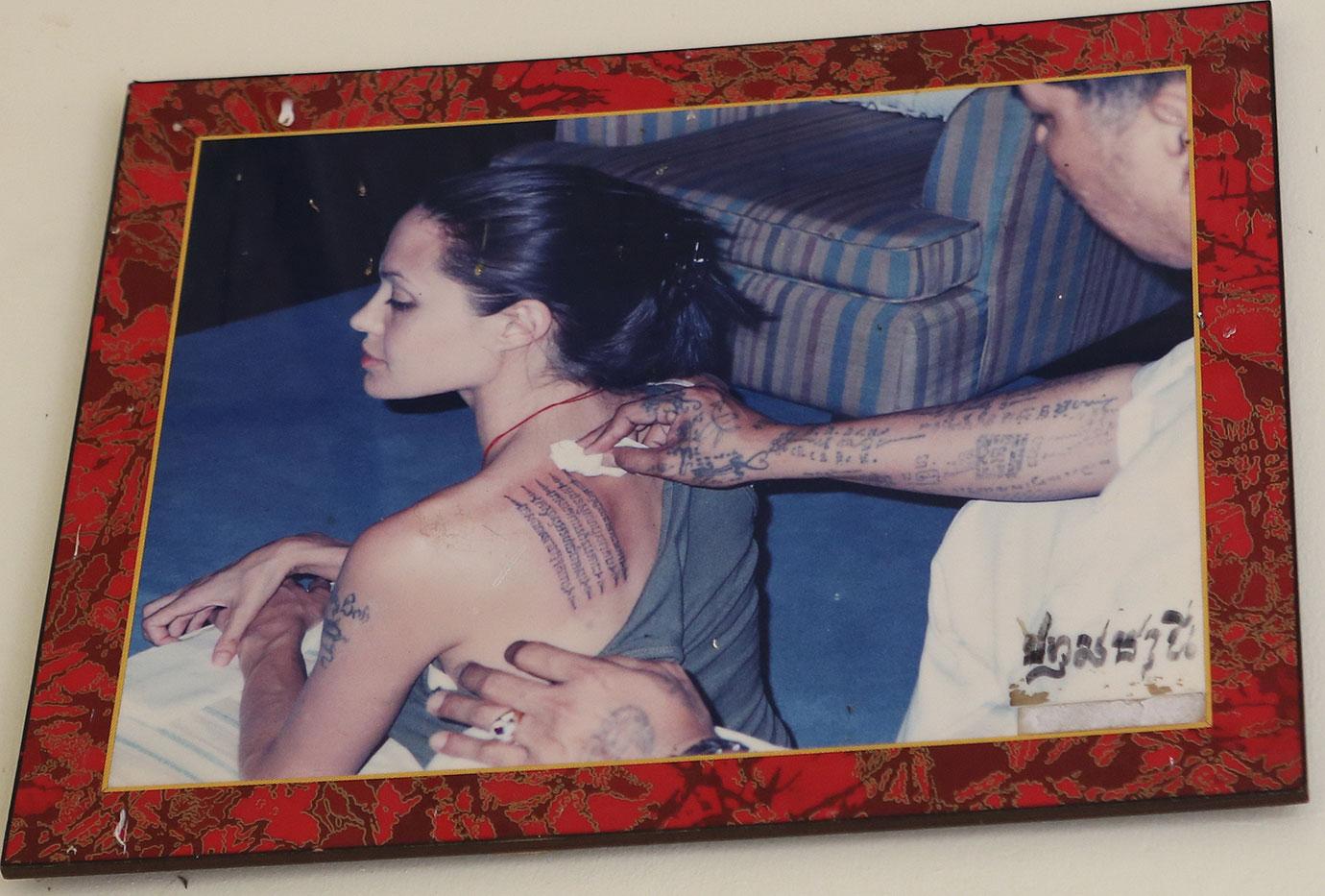 //angelina jolie back tattoos brad pitt divorce