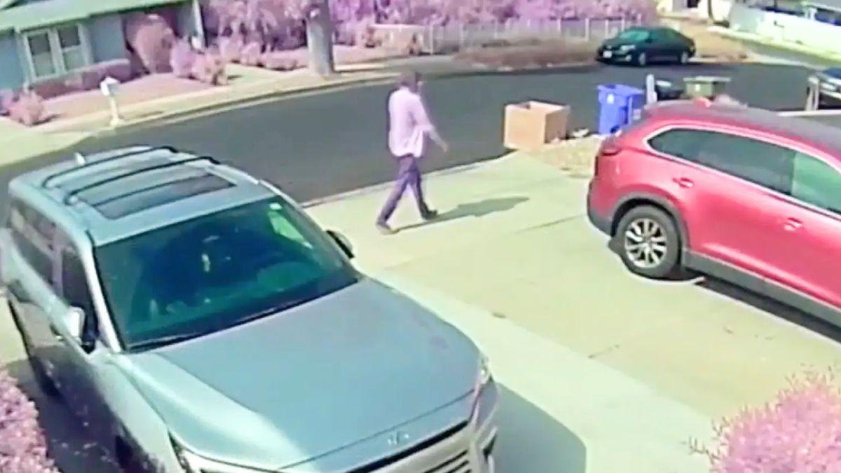 Michael Gledhill strolled calmly down the street away from the scene. 
