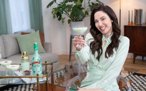 whitney cummings cheers with baileys vanilla mint shakehorizontal