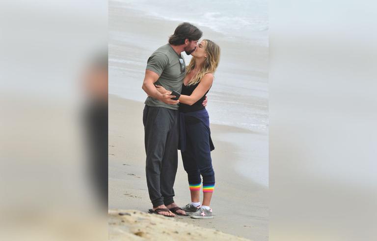 Denise Richards & Aaron Phypers Show PDA On Beach Honeymoon