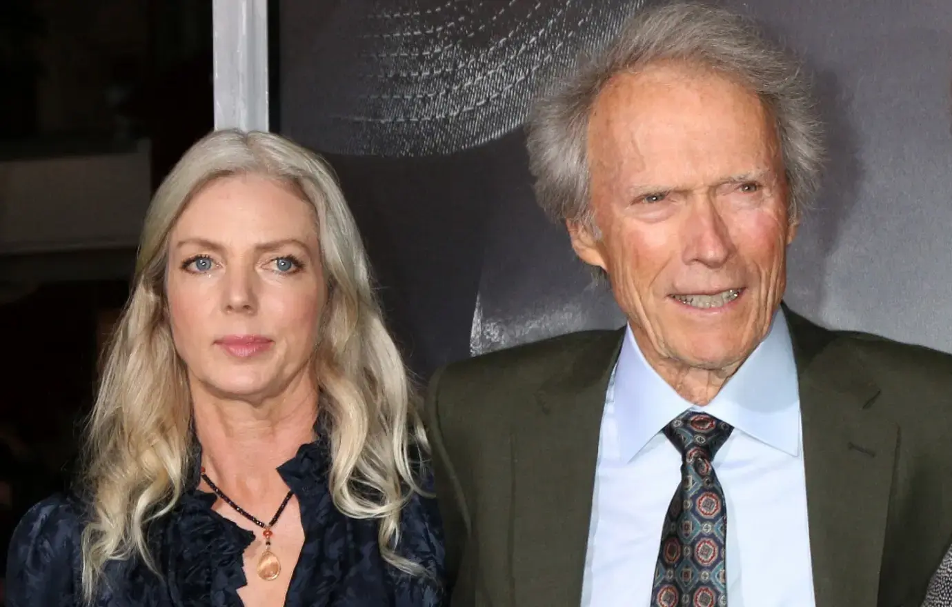 Photo of Christina Sandera and Clint Eastwood.