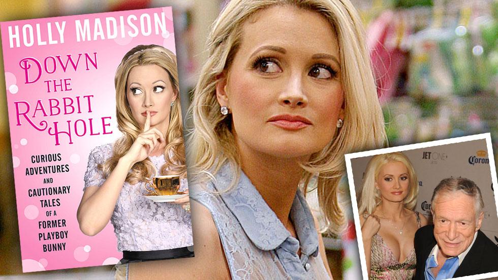 Five Words Or Less: Holly Madison Is Hiding ______ Under Her Dress