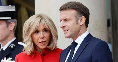 Photo of Emmanuel and Brigitte Macron