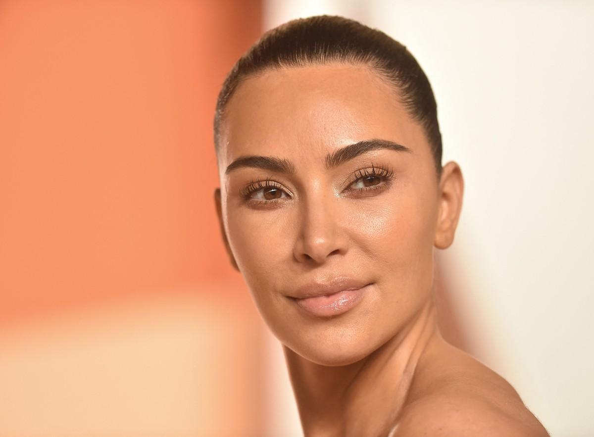 An insider said Kim Kardashian is being blamed for Lewis Hamilton's performance despite skipping the race in Tokyo.