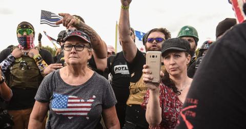 donald trump interrupted qanon conspiracy chants new hampshire rally