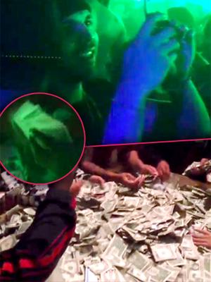Floyd Mayweather makes money rain down at Miami nightclub