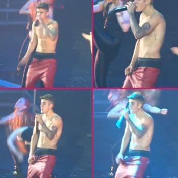 Bieber's pants fall down on stage