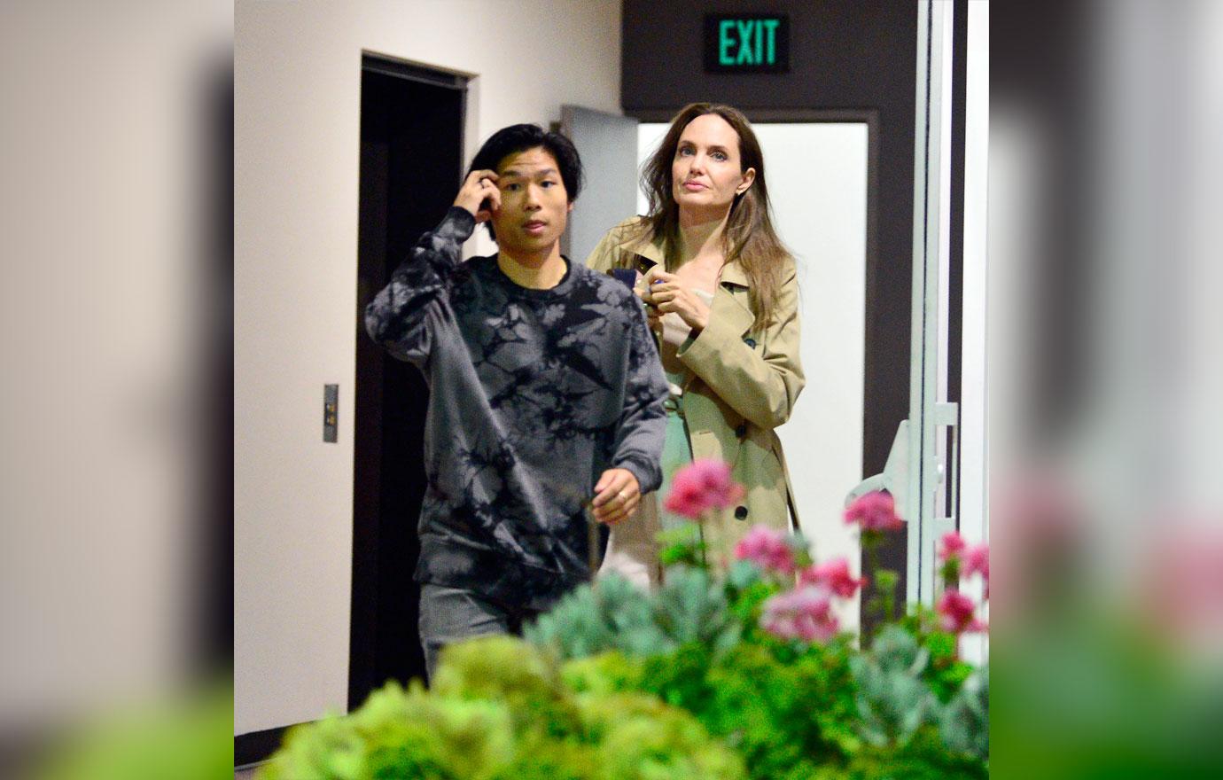 A make up free Angelina Jolie spends the night with her son Pax as they leave sushi park restaurant in West Hollywood.