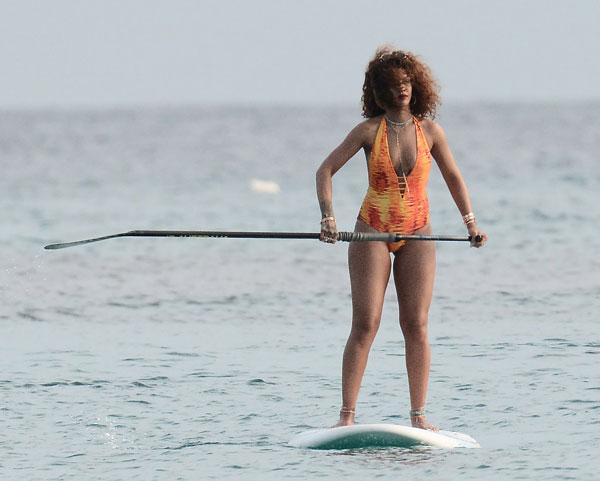 //rihanna swimsuit paddleboarding photos