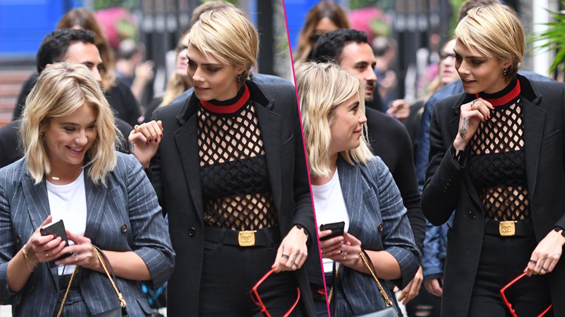 Ashley showed co star Cara Delevingne her phone as they both appeared to laugh as they attended press during the TIFF 2018 festival in Toronto.