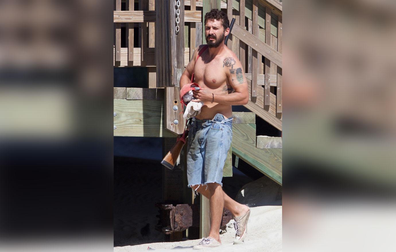 //Shia labeouf shirtless beach shotgun